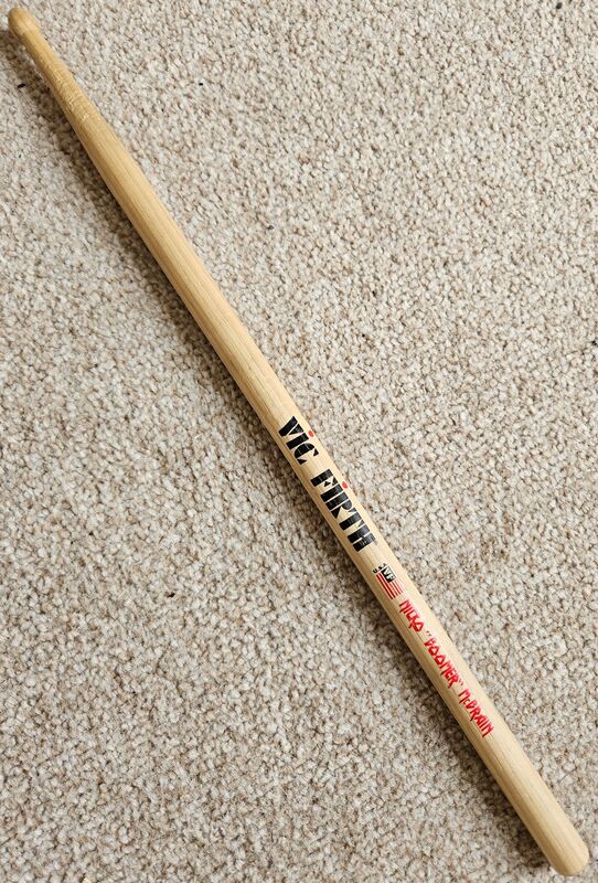 Nicko Boomer McBrain drumstick from Graspop 2003